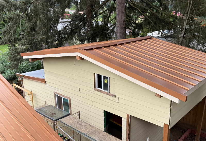 Completed standing seam roof on a detached building