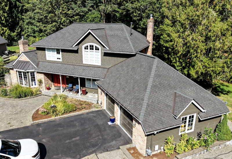 Aerial view showing the completed roof and intersecting rooflines